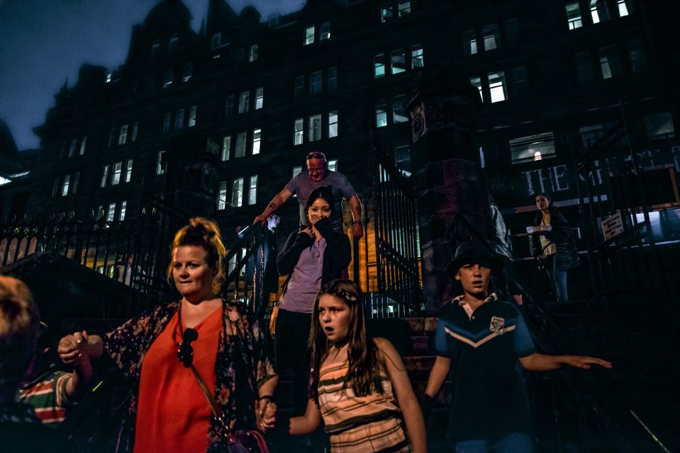 Edinburgh: Comedy Horror Ghost Bus Tour - Necropolis Bus Company details inside the midnight-black ride