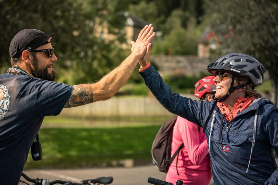 Edinburgh: Sightseeing Bike Tour - Off-the-radar stops: canals, tunnels, volcano views, and coast