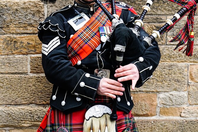 Edinburgh: Stirling Castle & Loch Lomond Private Luxury Day Tour - Balmaha: Tom Weir statue, coffee, and a loch-side pause
