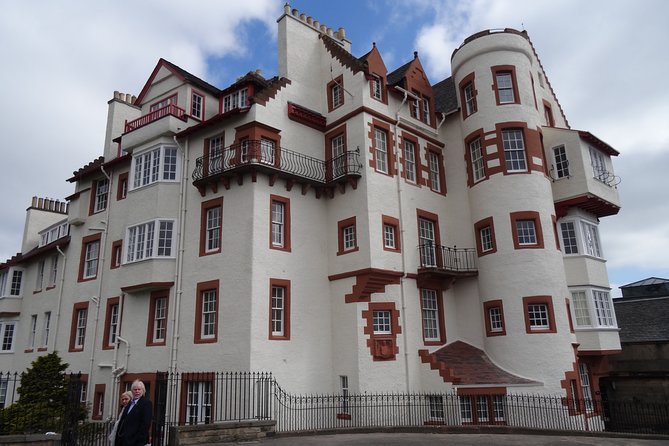 Essential Walking Tour of Edinburgh's Old Town - Canongate Kirk and Holyroodhouse: the walk ends where royalty lives