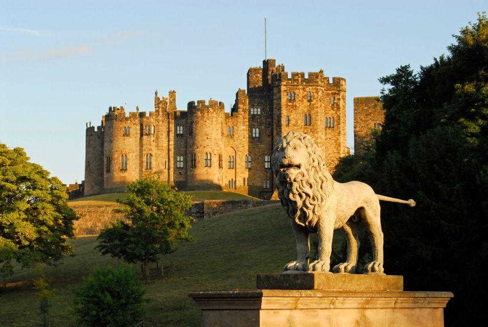 From Edinburgh: Day Trip to Bamburgh and Alnwick Castle - Bamburgh Castle: Seaside Views With Kingdom-Level Backstory