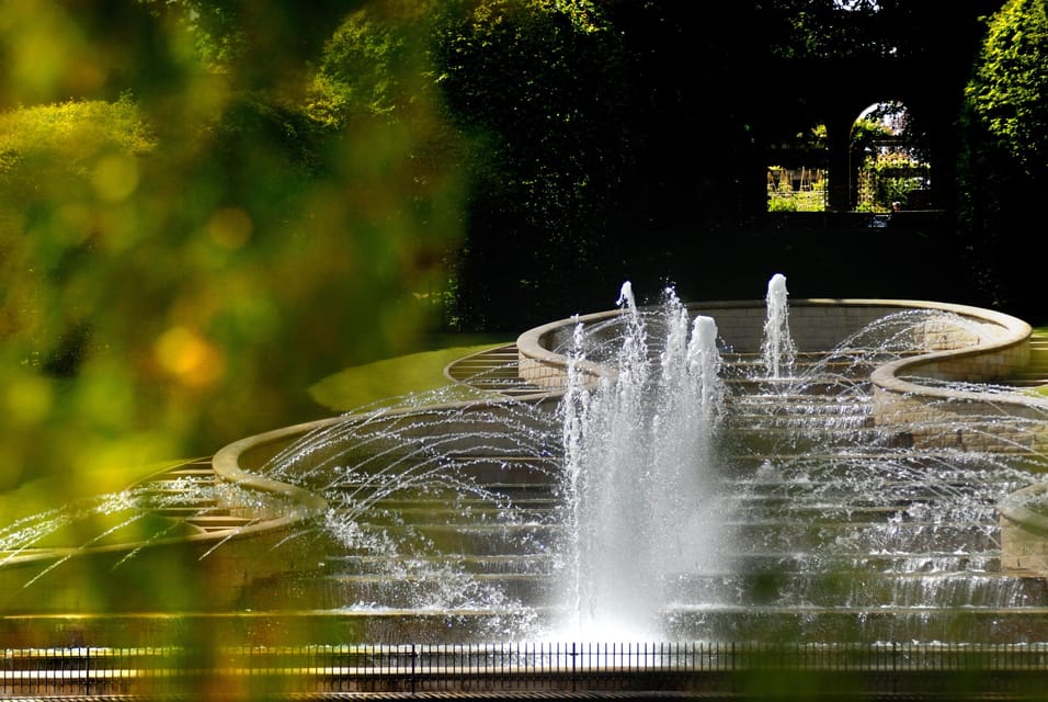 From Edinburgh: Holy Island, Alnwick Castle & Northumbria - Alnwick Gardens: Grand Cascade and the guided Poison Gardens