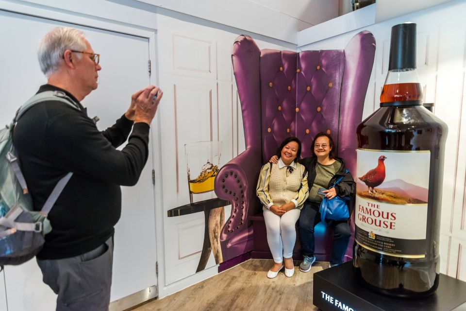 Full-Day Edinburgh Military Tattoo & Scottish Highlands Tour - Trossachs National Park and Loch Earn: green hills with a Rob Roy thread